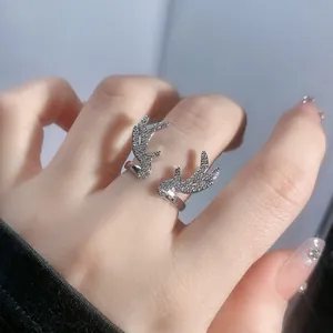Close-up of silver reindeer antler open ring with sparkling pavé crystal detail