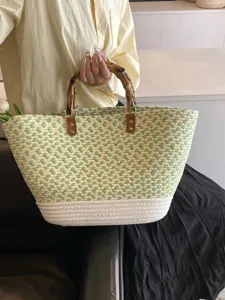 Elegante bolso de playa grande de paja tejida con asas de bambú en verde y blanco espiga