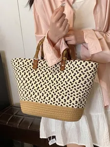 Bolso de paja tejido de gran capacidad con asas de bambú para las vacaciones de verano