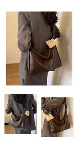 Large brown faux leather tote bag with plush charm shown from multiple back angles.