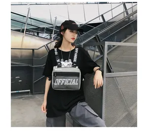 Urban streetwear grey tactical chest rig bag shown on a model in a city setting