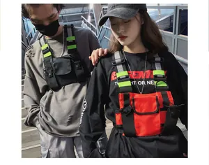 Urban streetwear tactical functional chest bag with reflective straps worn by models