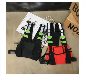 Detailed view of black and red tactical hip-hop chest bags with reflective silver strips