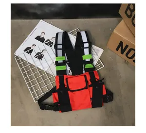 Close-up of tactical utility chest rig bag with reflective straps in bright red