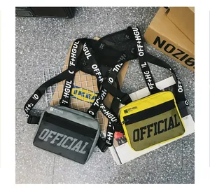 Detailed view of yellow and grey tactical hip-hop chest bags with mesh pockets.