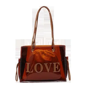 Bolso transparente marrón ámbar de moda con bolsa con cordón y estampado LOVE moderno
