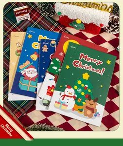 Collection of festive A5 Christmas notebooks featuring colorful cartoon illustrations