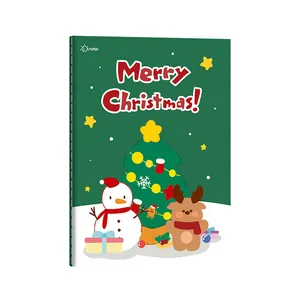 Festive Christmas A5 stitched notebook featuring a cute snowman and reindeer cover design