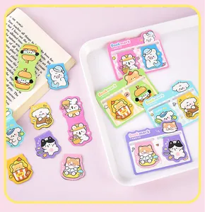 Close-up detail of various colorful cartoon animal shaped magnetic bookmarks on tray