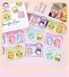 Detailed shot of cute animal magnetic bookmarks set on a pastel pink background