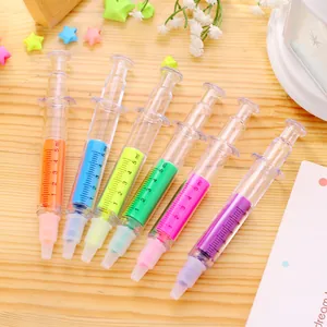 Close-up view of creative syringe-shaped highlighters in six vibrant fluorescent colors