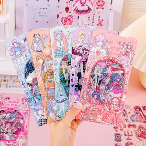 Handheld fan display of kawaii anime girl sticker sheets for scrapbooking DIY projects