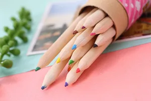 Macro view of 12-color wooden pencils in a pink cartoon storage tube for students and kids