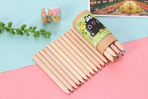 Detailed view of 12-color mini pencils spread next to a cartoon bear themed storage tube.