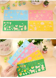 Set of colorful plastic drawing stencils with various fun cutout shapes for kids