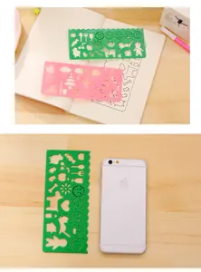 Detail view of colorful plastic drawing stencil rulers with various animal patterns