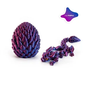 3D printed articulated dragon and dragon egg set featuring a metallic laser purple finish.
