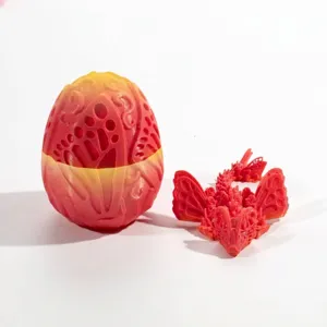 Detail view of 3D printed dragon egg and articulation dragon toy