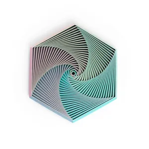 Macro view of a 3D printed fractal fidget hexagon with teal and pink gradient