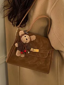 Sac à Épaule Minimaliste en Cuir PU pour Femmes Sac à Main Rétro Avec Pendentif Ours Serrure Sac Bandoulière