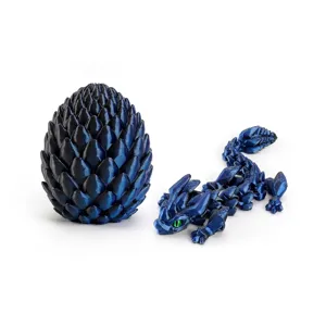 3D printed articulated dragon and crystalline dragon egg set in metallic dark blue finish