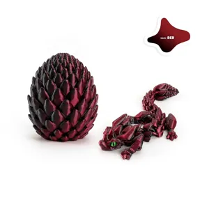 Detailed 3D printed articulated dragon and scale-textured egg in dark red finish.