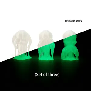 Detailed 3D printed Hear See Speak No Evil skull set with glowing green luminous effect