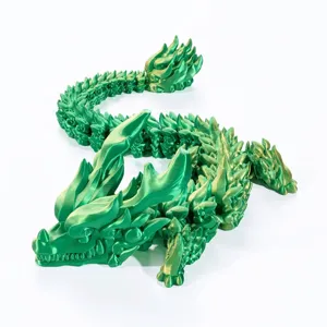 Detail view of 3D printed articulated dragon ornament in silk fantasy green color