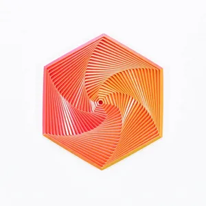 Detailed top-down view of a 3D printed fractal fidget hexagon with orange gradient