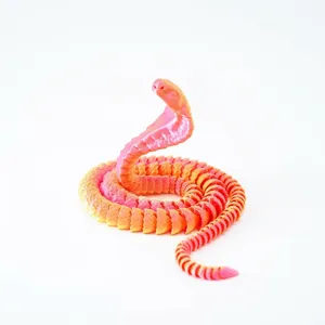 Juguete de serpiente cobra articulado impreso en 3D con degradado rosa y amarillo