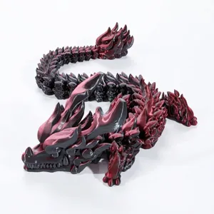 3D printed articulated dragon ornament in dark red finish close up view