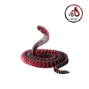 Vista macro detallada de las articulaciones móviles impresas en 3D en cobra roja