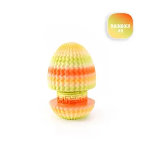 Intricate detail of a 3D printed rainbow maze dragon egg toy with layered color patterns.