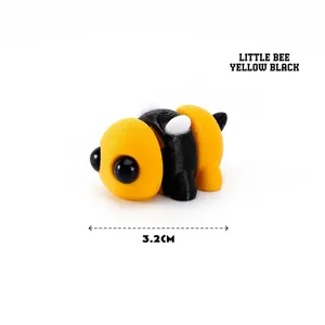 Vista detallada de la linda figura de abeja articulada impresa en 3D con tamaño 3,2 cm.