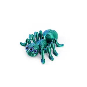 Macro detail of 3D printed articulated spider figurine in metallic laser green finish