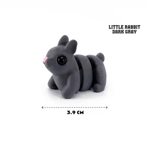 Vista detallada de una figura de conejo articulada impresa en 3D gris oscuro de 3,9 cm