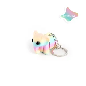 Detailweergave van een schattige 3D-geprinte olifant sleutelhanger in levendige regenboogkleuren.