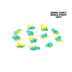 Colección de 12 mini figuras articuladas de animales impresas en 3D en colores degradados.
