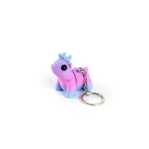 Articulated 3D printed reindeer keychain with a purple and blue gradient finish