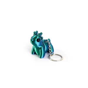 Close-up view of a laser green 3D printed articulating reindeer keychain with metal ring