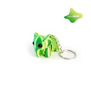 Macro-weergave van een 3D-geprinte groene olifant sleutelhanger