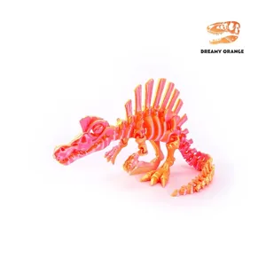 3D printed iridescent Spinosaurus skeleton toy ornament in dreamy orange finish.