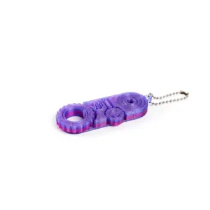 Close-up of 3D printed purple gradient gear fidget toy keychain for portable stress relief