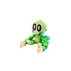 Figura de mono impresa en 3D con articulaciones móviles y acabado degradado verde