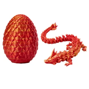3D printed red silk articulated dragon figurine with matching scale dragon egg set