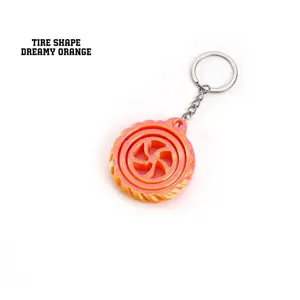 Nahaufnahme eines 3D-gedruckten Reifen-Fidget-Spinner-Schlüsselanhängers in Orange