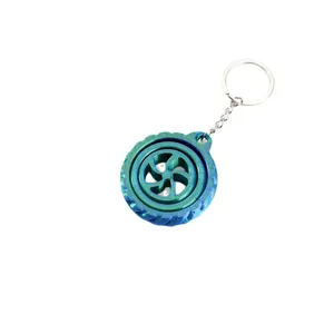 3D-gedruckter Fidget Spinner Schlüsselanhänger mit einem blau-grünen Wirbel-Turbinendesign