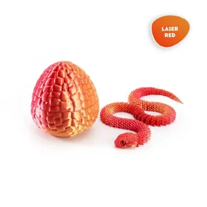 Detailed view of 3D printed articulated viper and textured egg set in laser red