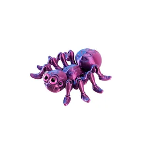 3D printed multi-eyed spider ornament with movable joints in purple silk finish