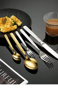 Detailed view of 304 stainless steel cutlery set with Roman column fluted handles.